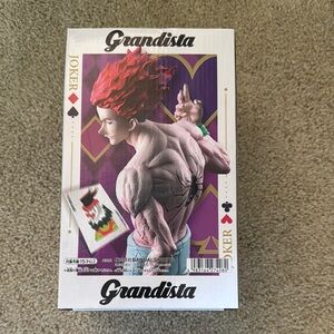 Vibrant Red and Purple Anime Sculpture